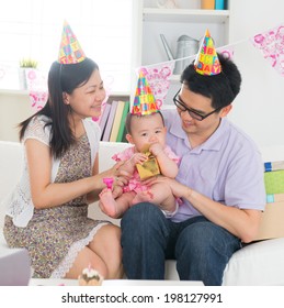 Asian Baby With Family Celebrating Baby Birthday Party