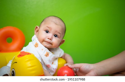 Asian Baby Girl Has A Messy Mouth After Eating Food For The First Time