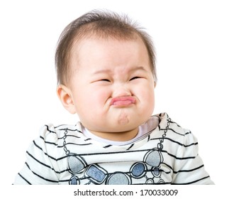 Asian baby girl make upset face