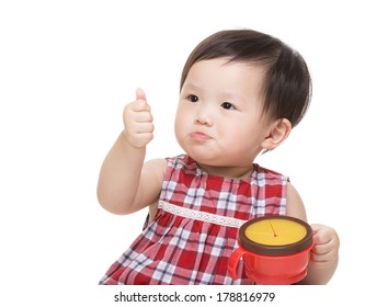 Asian Baby Girl With Snack Box And Thumb Up