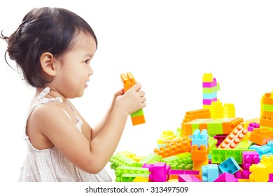 Asian Baby Girl, Toddler, Playing Colorful Blocks Isolated On White Background.