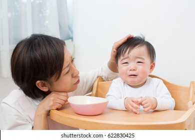 Asian Baby And Mom