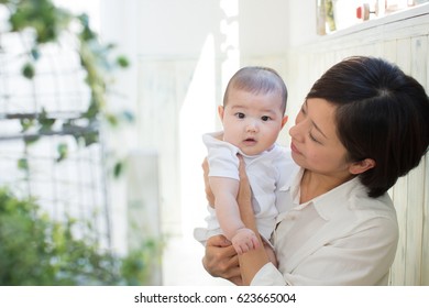 Asian Baby And Mom