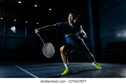 Asian Badminton Player Is Hitting In Court