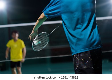 Asian Badminton Player Is Hitting In Court