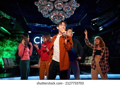 Asian Band Singing And Dancing At Karaoke Party, Njoying Friendship Together In Bar, Concept Of Party, Fun, Holiday, Relaxation, Spend Day-off In Karaoke Together With Friends, Enjoy Time In Club,