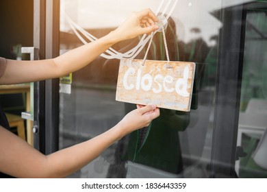 Asian Barista Woman New Normal Worker Hanging Out Closing Sign Closing Down Shop Due To COVID-19 Coronavirus Pandemic, Café Restaurant Store Small Startup Fail Business Owner Shutting Down Bankrupt