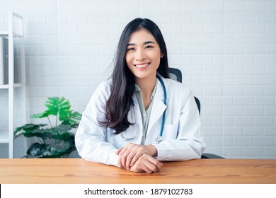 Asian Beautiful Female Doctor Working Online Remote Connection Giving Advice And Examination Diagnosis To Patient Medical Healthcare Distancing, Contact Video Call Talking Interacting With Patient