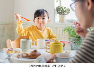 asian beautiful girl having breakfast - Powered by Shutterstock