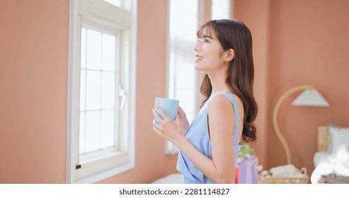 asian beautiful girl leisurely drinking tea and coffee happily enjoy her afternoon - Powered by Shutterstock