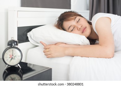 Asian beautiful girl sleeps in the bedroom