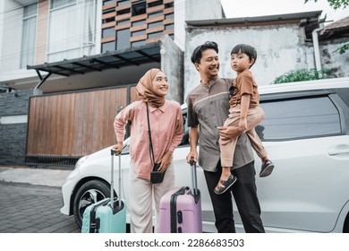 asian beautiful muslim family with suitcase travelling by car concept - Powered by Shutterstock