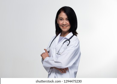 Asian Beautiful Senior Doctor Nurse Woman In Uniform With Stethoscope In Medical Hospital, Portrait 50s 60s Years Old Aging Society Make Up Black Short Hair, Studio Lighting Gray Background Copy Space