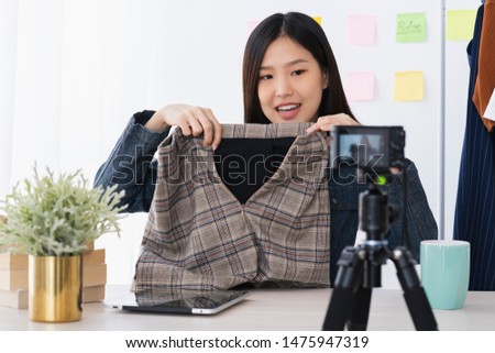 asian beautiful asian  vloger or bloger present cloth dress online business shop online ideas concept