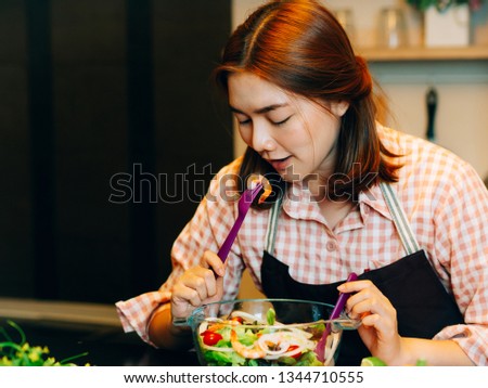 Asian beautiful woman during make the spaghetti food in the kitchen