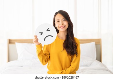 Asian Beautiful Woman Happy And Smile Sitting On Bed With Holding Paper Sad Emoticon Symbol