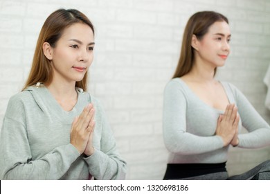 Asian beautiful woman Yoga meditation with Respect hands healthy fitness for the beautiful mind in the lifestyle - Shutterstock ID 1320698186