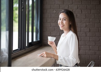 Asian Beautiful Women Drinking Coffee With Attractive Smile, 20-30 Year Old.