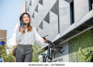 Asian Beautiful Young Woman Use Smart Mobile Phone Talk With Business During Go To Office Work At City Street With Bicycle, Happy Lifestyle Business Female Commuting Outside In Morning, Eco Friendly