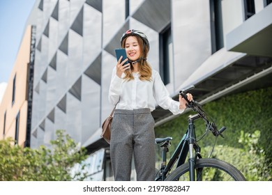 Asian Beautiful Young Woman Use Smart Mobile Phone Talk With Business During Go To Office Work At City Street With Bicycle, Happy Lifestyle Business Female Commuting Outside In Morning, Eco Friendly