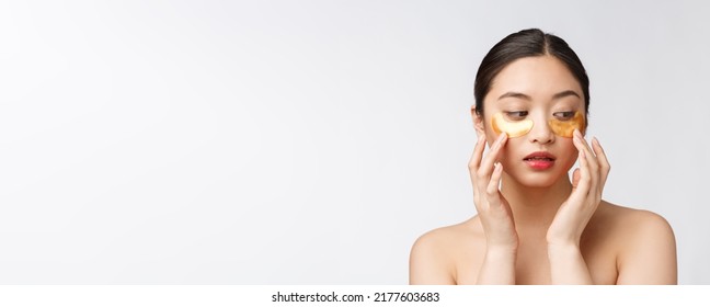 Asian Beauty Teenager Woman Care Her Skin With Gold Eye Masks Patches Under Eyes