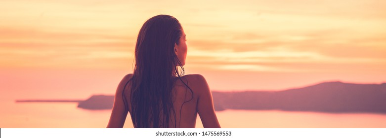 Asian Beauty Woman Silhouette At Sunset With Long Healthy Wet Hair 
 Enjoying Nature Background Banner Panorama. Model From Behind Relaxing At Landscape.