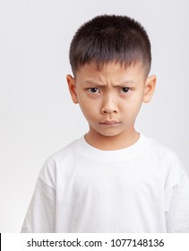 Asian Boy Angry On White Background.