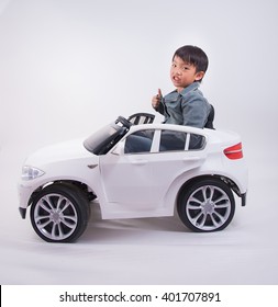 asian boy car funny toy kid driver happy cute speed cool rich suit
