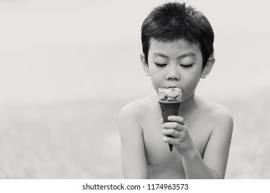 Asian Boy Children Eating Ice Cream Candid Snapshot Photography Art Mono Tone.