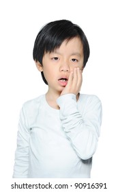 Asian Boy Dressed In White With Tooth Ache