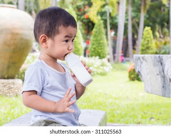 Asian Boy Drinking Milk