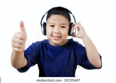 Asian boy with headphones listening to music.