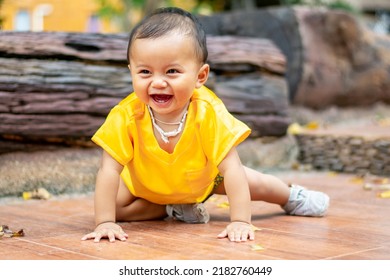 Asian Boy Laughing Smile With Milk Teeth For The First Time And Have Fun Playing In The City Park