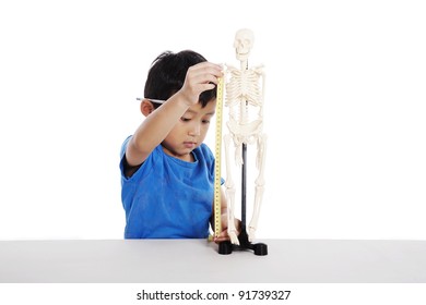 Asian Boy Learns Biology Isolated On White