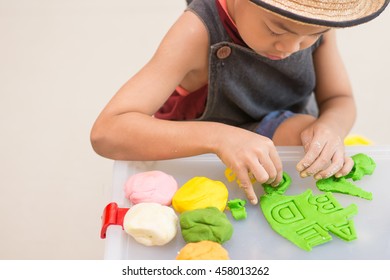 Asian Boy Play Alphabet Doh,dough