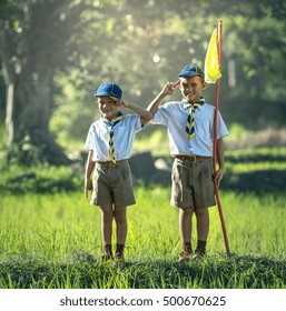 Asian Boy Scout Making An Oath