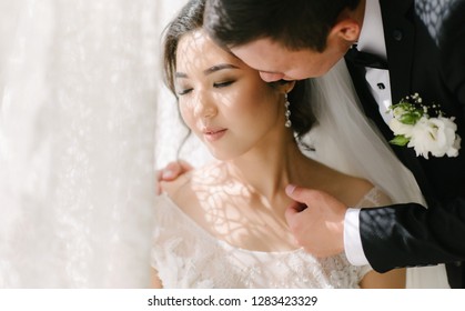 Asian Bride And Groom Kiss