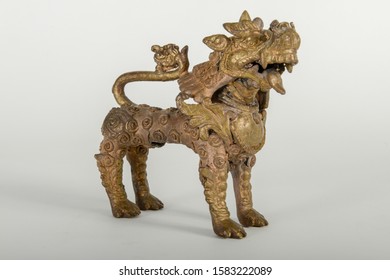 Asian Bronze Lion Statue Isolated On White