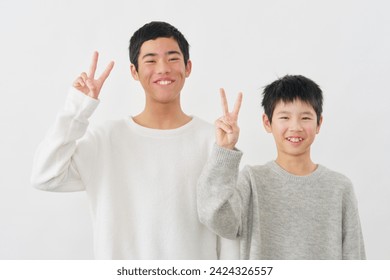 Asian brother in white background