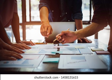 Asian business adviser meeting to analyze and discuss the situation on the financial report in the meeting room.Investment Consultant,Financial Consultant,Financial advisor and accounting concept - Shutterstock ID 1458131615