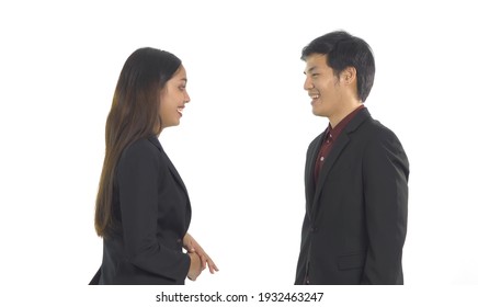 An Asian Business Couple Talking To Each Other. Colleagues In Meeting Isolated On White Background. People Lifestyle