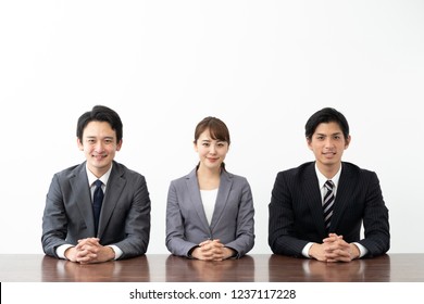 Asian Business Group In Conference Room On White Background