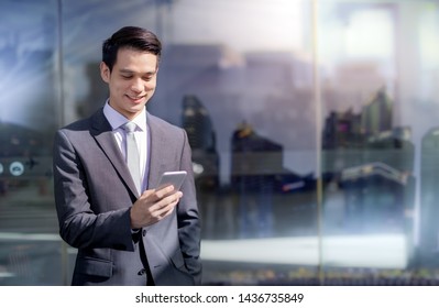 Asian Business Man In City  Metropolitan   So Use Mobile Job Happy Look Leadership