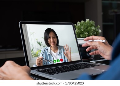 Asian Business Man, Colleagues Making Facetime Video Calling, Using Zoom Online Meeting App Via Laptop Computer At Home Office, Teleconference, Video Conference, Work From Home, Telework Concept