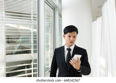 Asian Business Man Looking Message Telephone