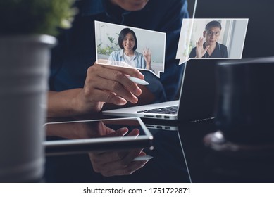 Asian Business Man Making Facetime Video Group Conference. Business Team Using Zoom Online Meeting App Via Laptop Computer In Video Call. Group Of People Smart Working From Home, Telework Concept