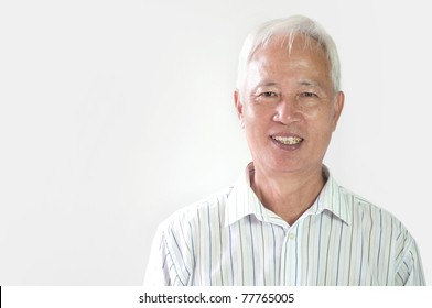 Asian Business Man Smiling In Formal Clothing With Plain Background