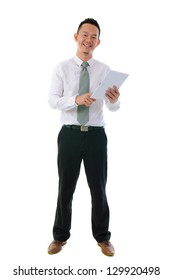 Asian Business Man Standing Holding A Digital Touch Screen Tablet Computer On White Background.