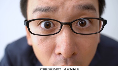 asian business man staring something - Shutterstock ID 1519821248