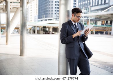 Asian Business Man Using Tablet